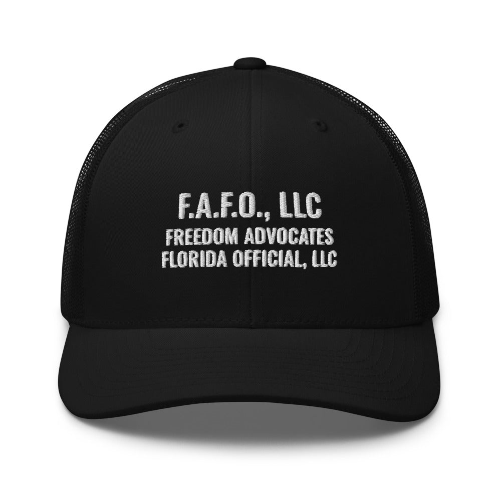 Full company mark embroidered on a Black Open Mesh Trucker Cap - real Printful mockup - Freedom Advocates Florida Official, LLC