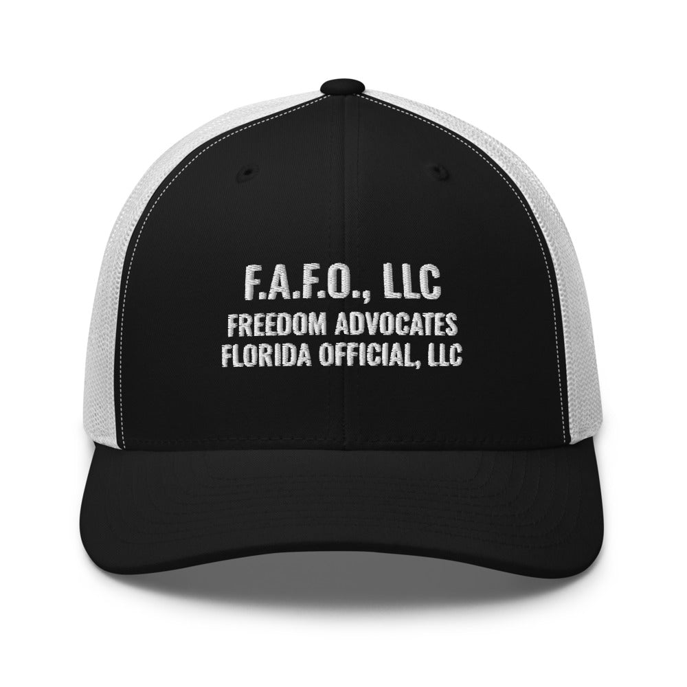 Full company mark embroidered on a Black / White Open Mesh Trucker Cap - real Printful mockup - Freedom Advocates Florida Official, LLC