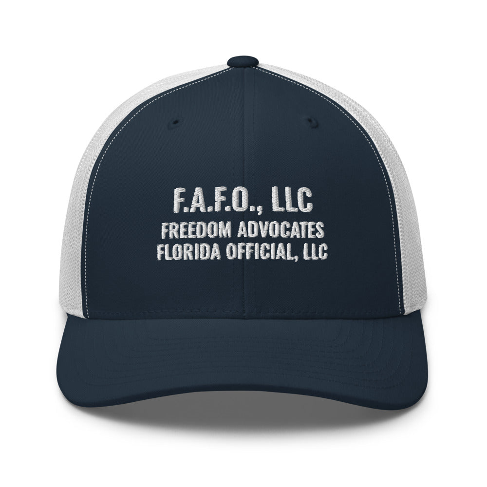 Full company mark embroidered on a Navy / White Open Mesh Trucker Cap - real Printful mockup - Freedom Advocates Florida Official, LLC