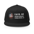F.A.F.O., LLC Stamp on a Black Printed Trucker Cap - real Printful mockup - Freedom Advocates Florida Official, LLC