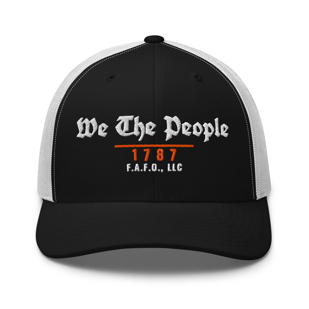 Mesh trucker cap in Black/ White - We The People 1787 with F.A.F.O., LLC stamped on the front